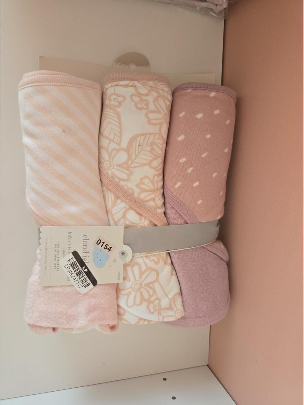 New three pack of infant hooded, towels.Item 154 bin 13